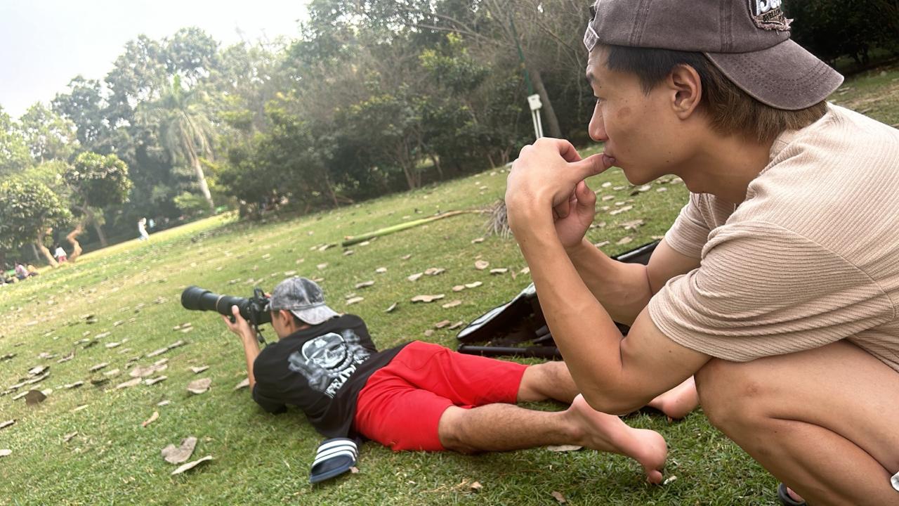 Learner practicing low-angle field photography in Manipur