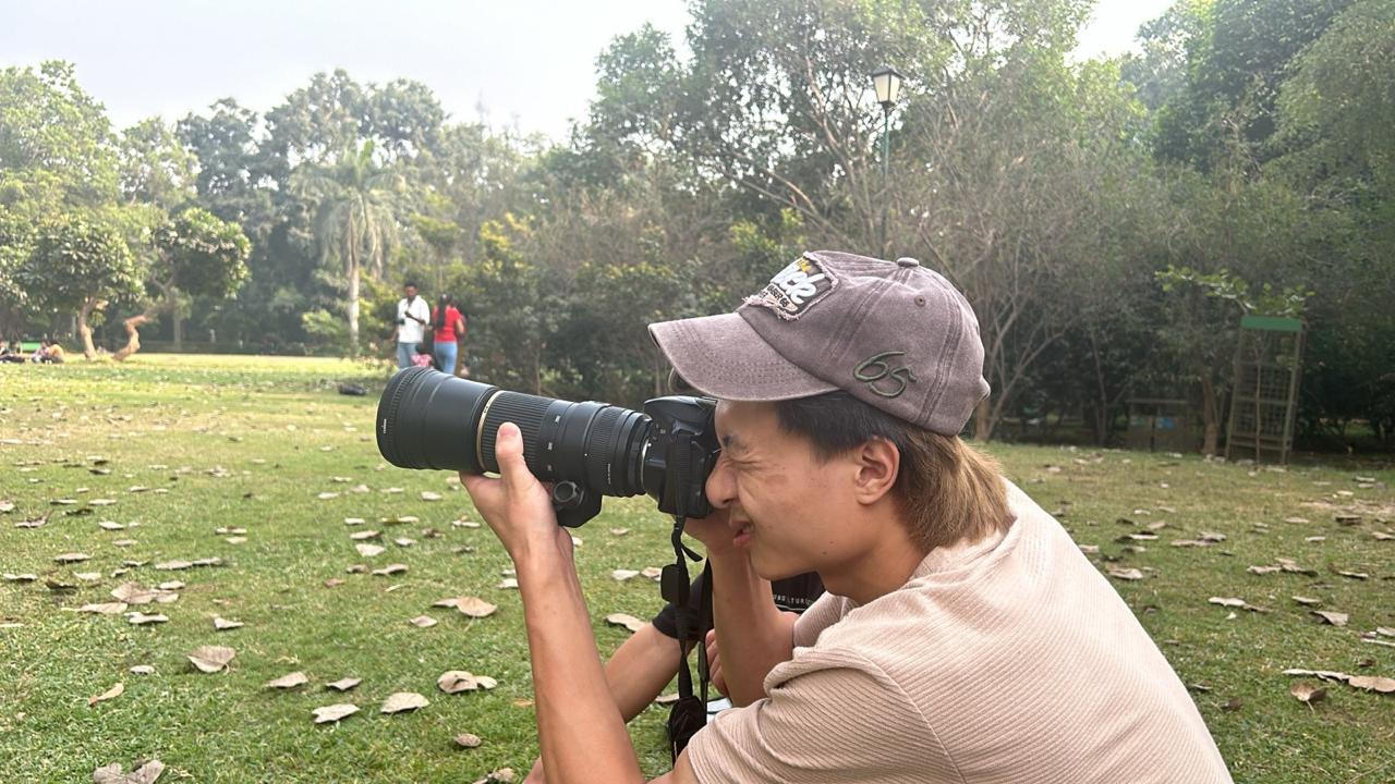 Learner from Manipur practicing field photography with a DSLR camera